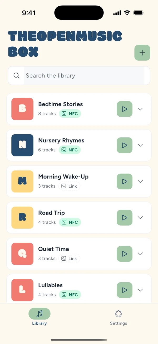 The app library, with two playlists already carrying a card badge and a third offering to link one.